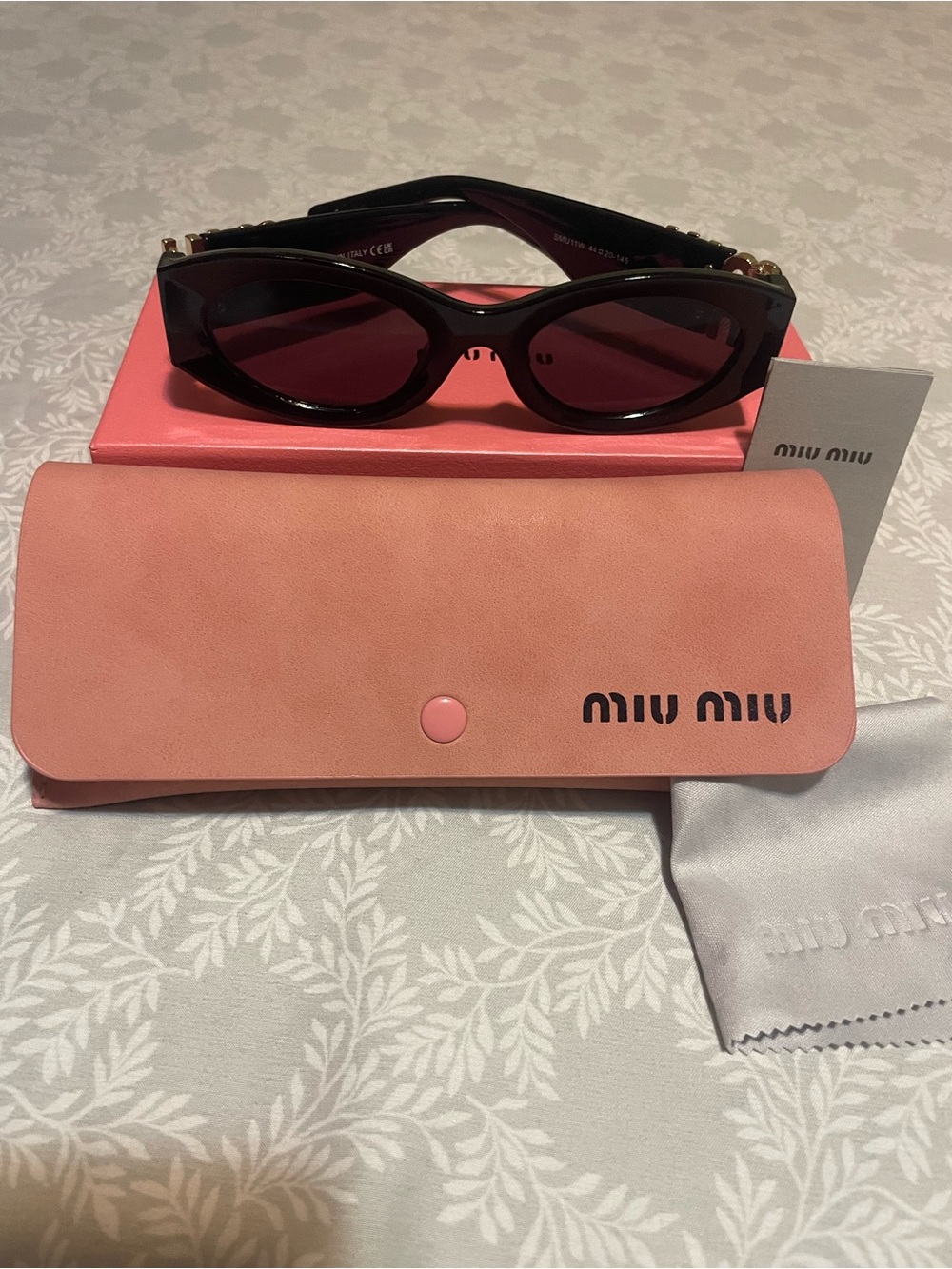 Miu Miu SMU11W black